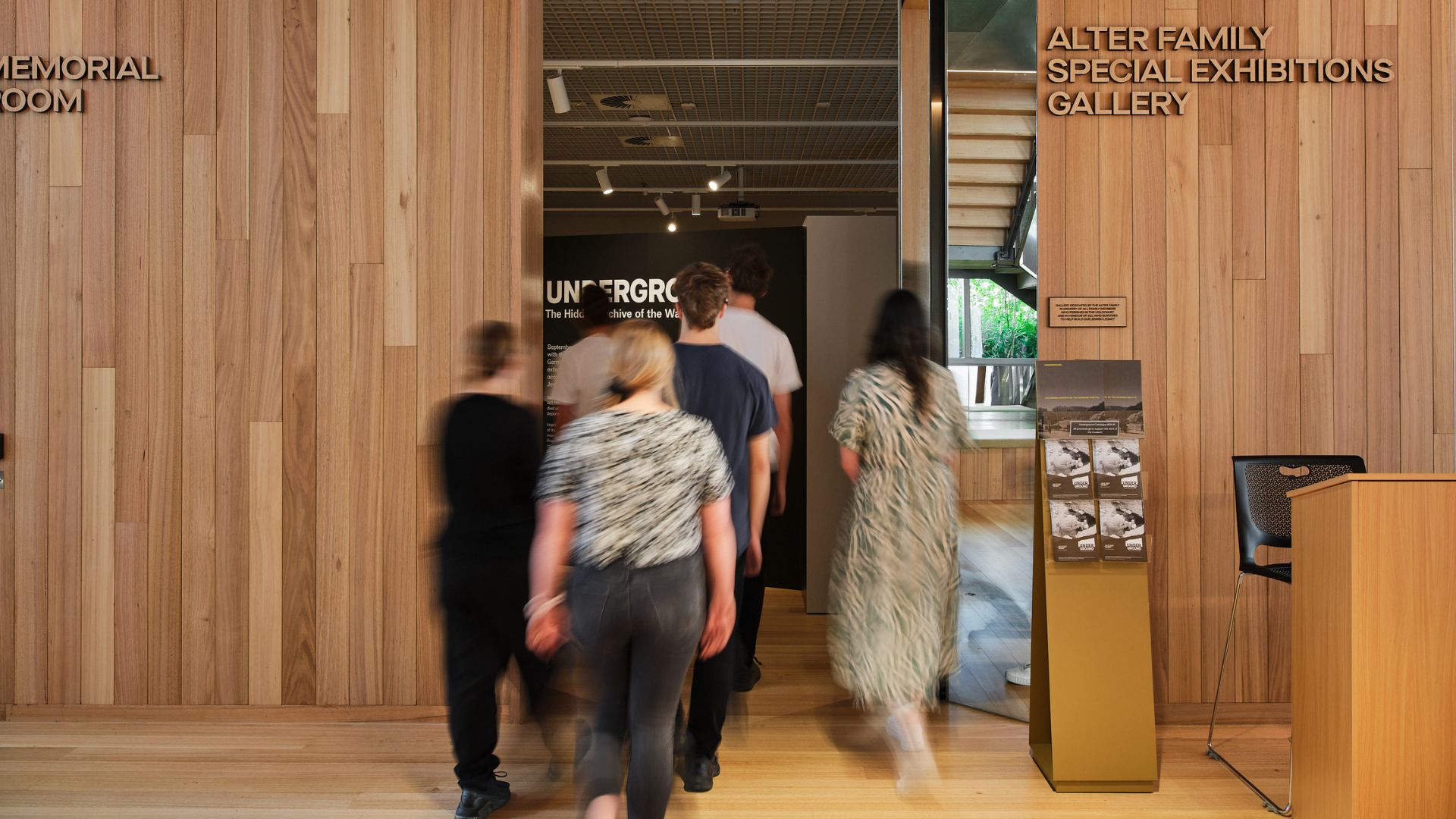 Visitors entering the &#039;Underground&#039; exhibition in the Alter Family Special Exhibitions Gallery. Photographed by Simon Shiff. 